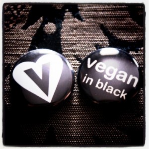 vegan in black buttons